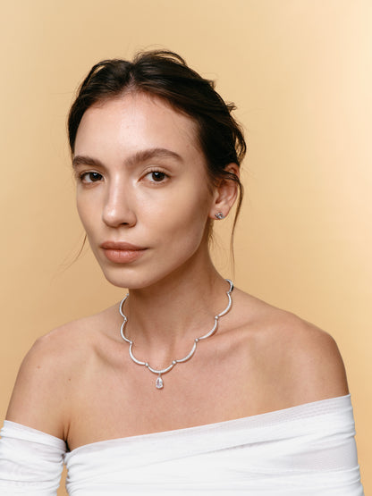 Courbette Earstud